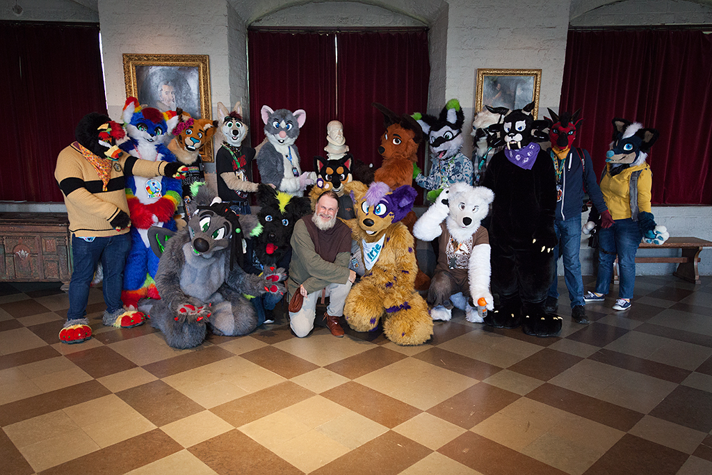 Fursuiters being guided around the castle